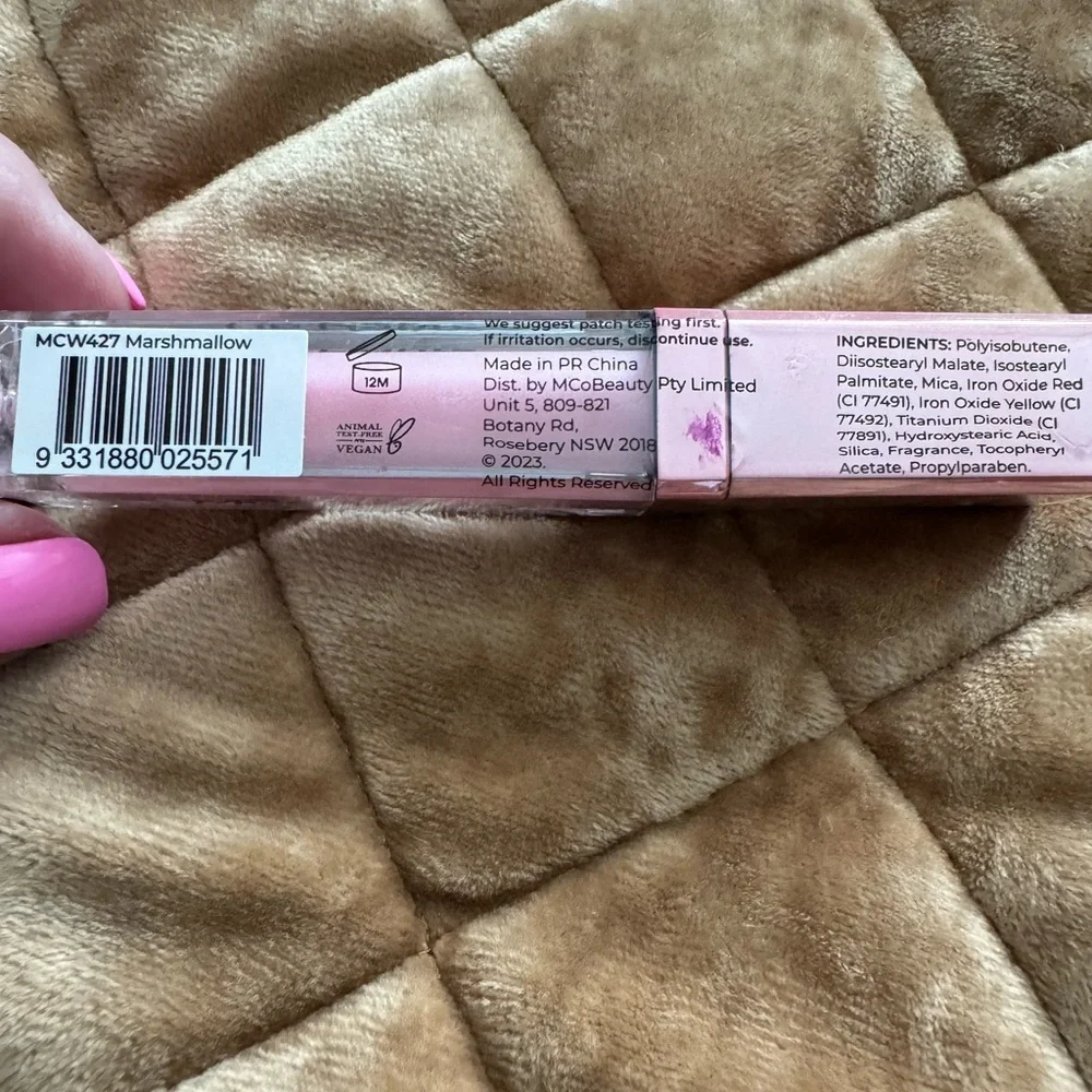 MCoBeauty lip gloss in “marshmallow.” Pretty pink shade with mirror on side 🩷